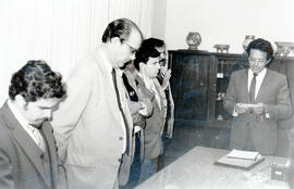 Fotografía con la imagen del acto de Juramentación y firma de un convenio entre la Universidad de...