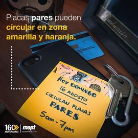 Afiche con información de circulación de placas pares en zona naranja y amarilla, esto en el cont...
