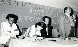 Fotografías con imágenes de una reunión de la Asociación de Desarrollo Integral de La Trinidad de...