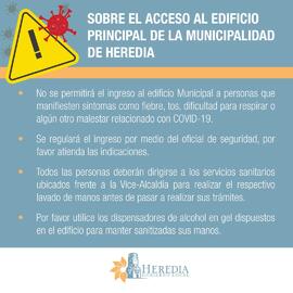 Afiche con iformación sobre el acceso al edificio principal de la Municipalidad de Heredia, esto ...